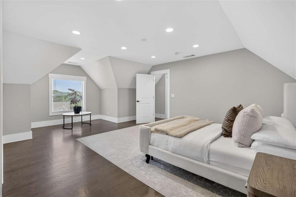 719 Austin Reynolds Road Bethlehem, GA 30620 - Photo 36 of 68 a bedroom with a bed and a table