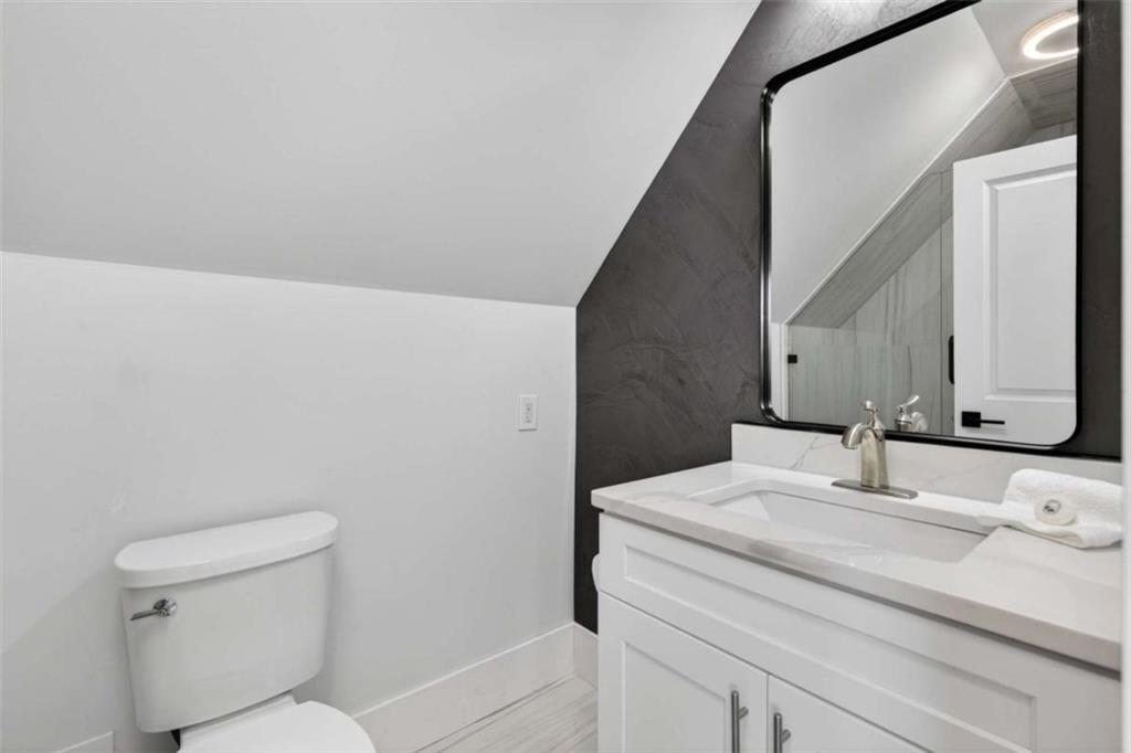 719 Austin Reynolds Road Bethlehem, GA 30620 - Photo 52 of 68 a bathroom with a sink and a toilet