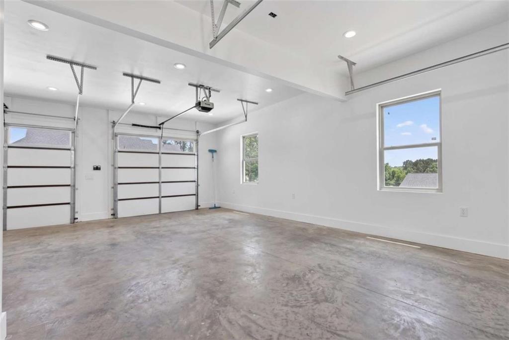 719 Austin Reynolds Road Bethlehem, GA 30620 - Photo 58 of 68 an empty room with windows and pillars in it
