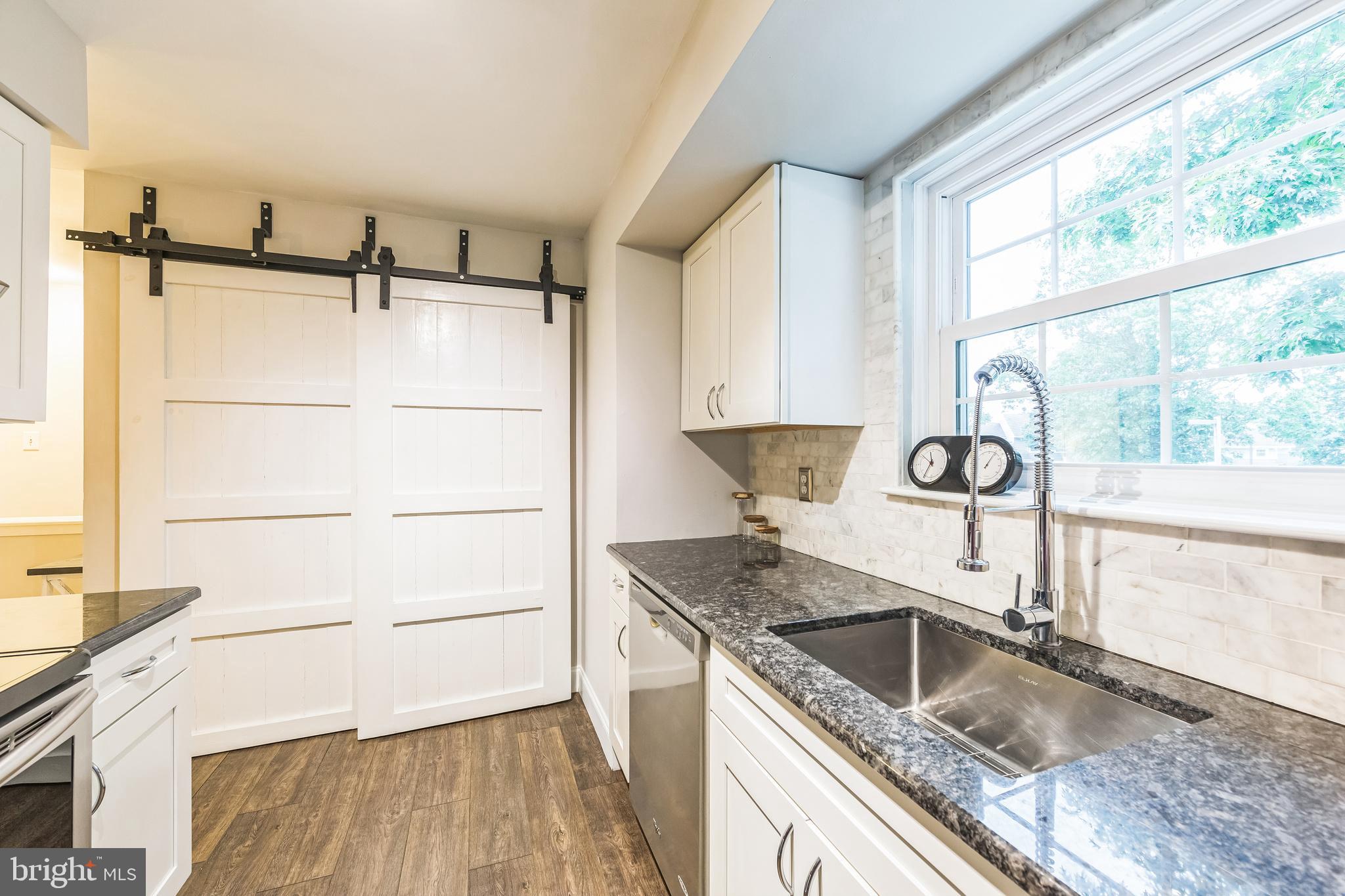 353 McIntosh Road, Unit 148 West Chester, PA 19382 - Photo 12 of 23 Covered Pantry and Laundry Area in Kitchen
