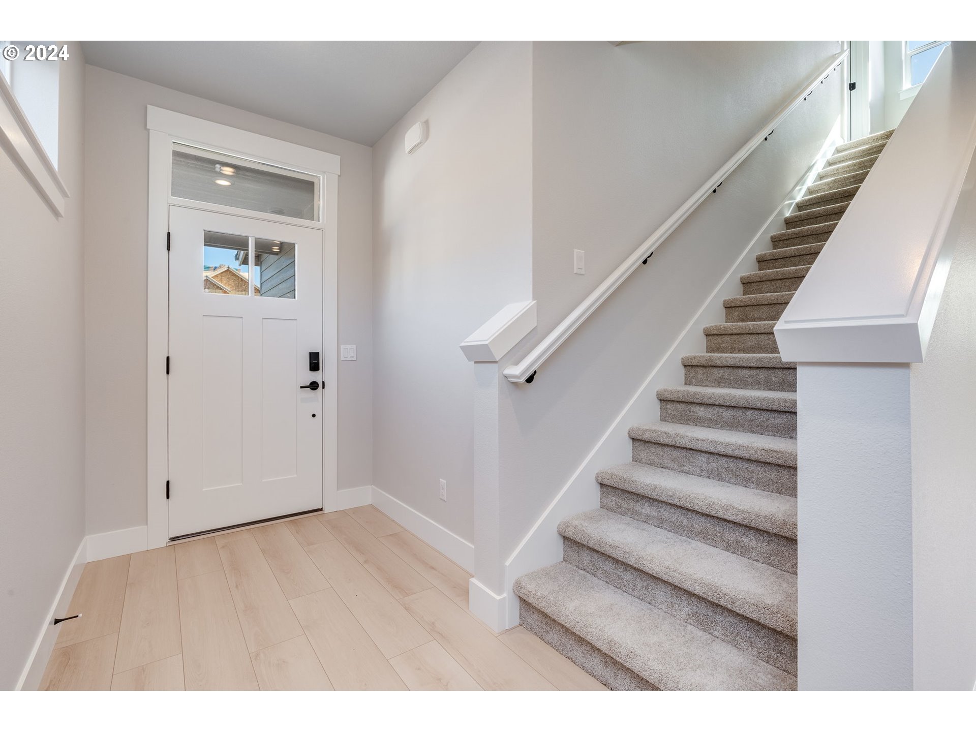3719 South Arwana Lane Ridgefield, WA 98642 - Photo 8 of 46 a view of an entryway with wooden floor