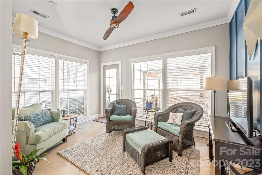 4108 Cedar Point Avenue Matthews, NC 28104 - Photo 18 of 41 a living room with furniture and a flat screen tv