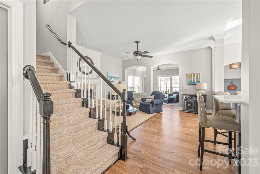 4108 Cedar Point Avenue Matthews, NC 28104 - Photo 20 of 41 a view of entryway and dining room with wooden floor