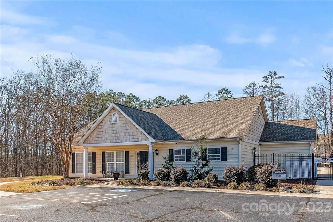 4108 Cedar Point Avenue Matthews, NC 28104 - Photo 37 of 41 front view of a house with a street