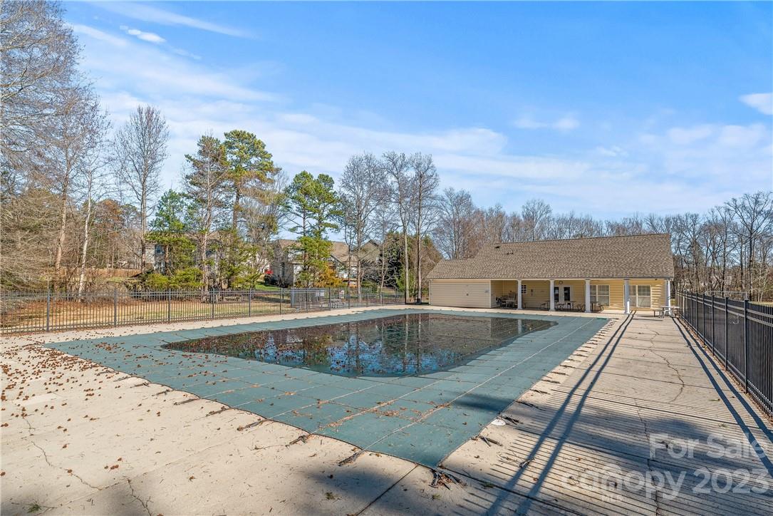 4108 Cedar Point Avenue Matthews, NC 28104 - Photo 38 of 41 a view of swimming pool with a yard