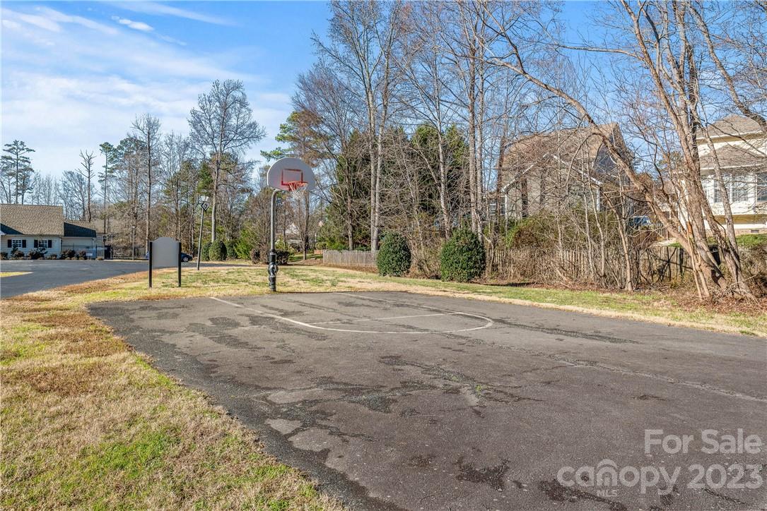 4108 Cedar Point Avenue Matthews, NC 28104 - Photo 40 of 41 a view of road with large trees
