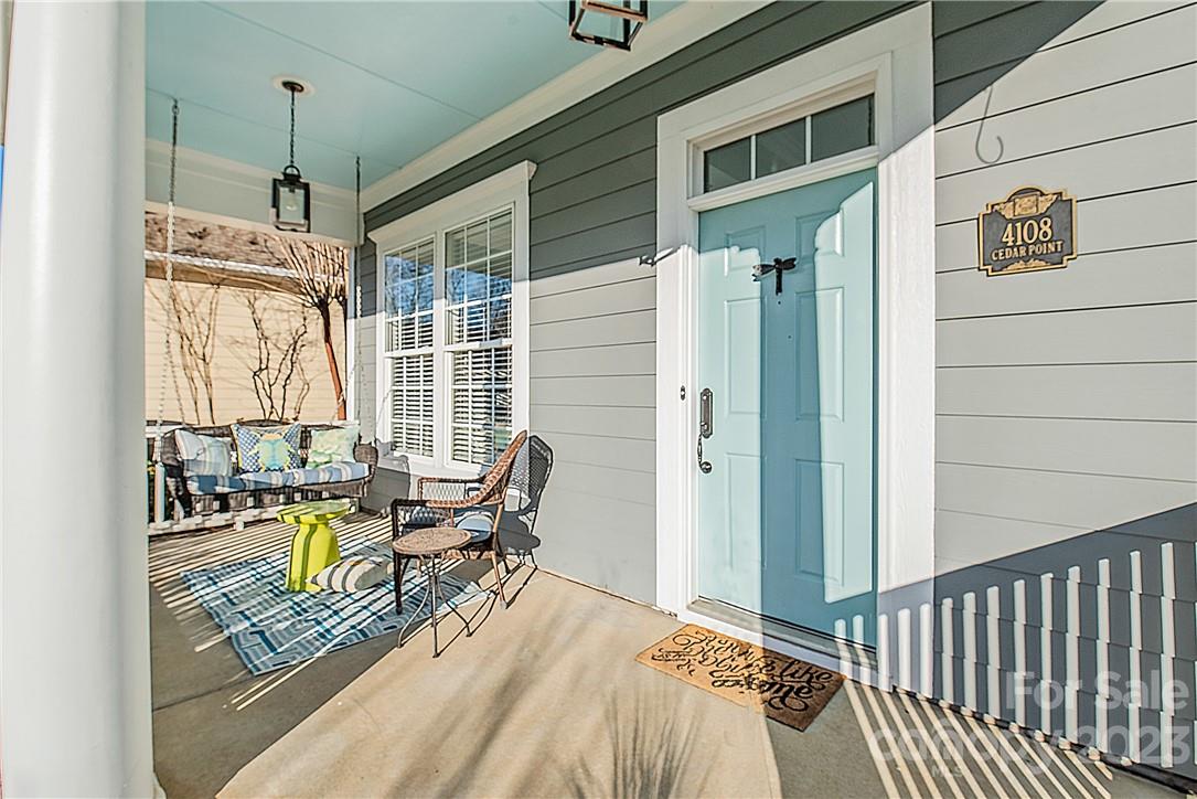 4108 Cedar Point Avenue Matthews, NC 28104 - Photo 6 of 41 a view of two chairs in the balcony