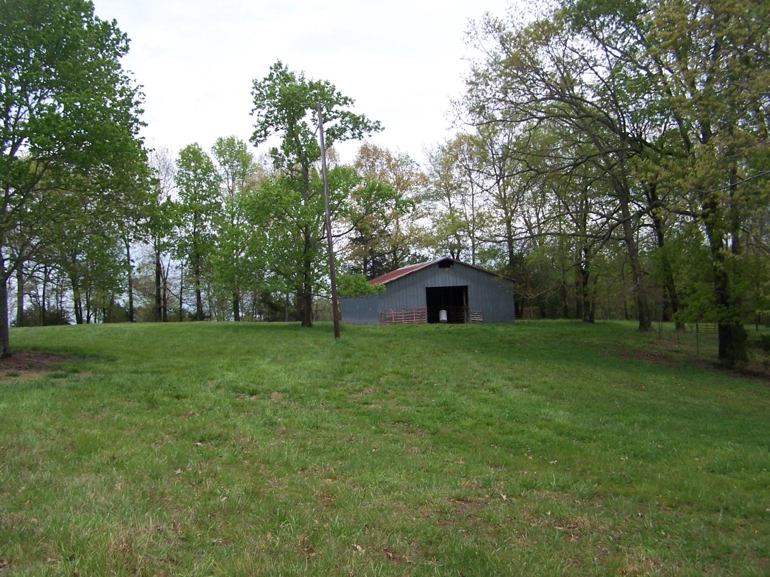 0 Jackson Hollow Road Goodspring, TN 38460 - Photo 19 of 29 a front view of a house with garden