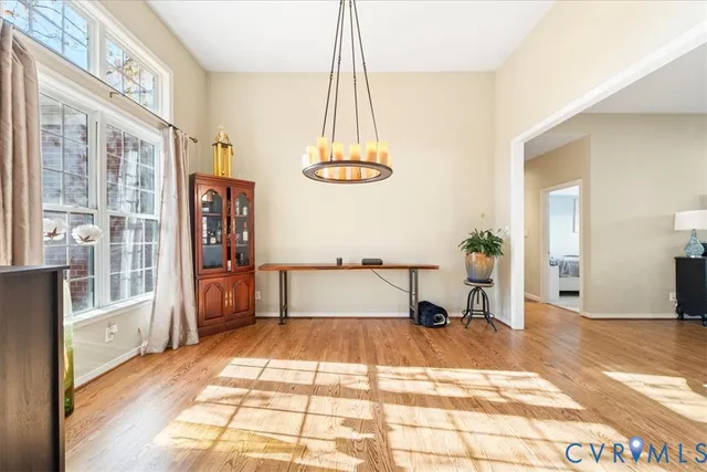 a room with gym equipment and a window