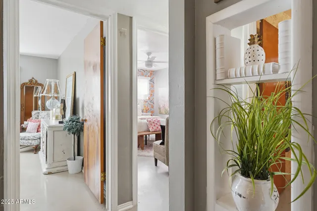 a kitchen with cabinets stainless steel appliances and a window