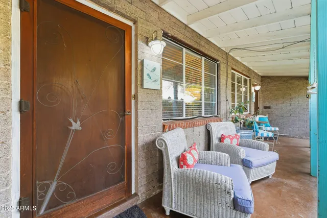 a view of a house with a yard and garage