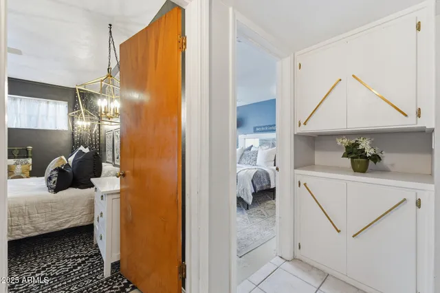 a kitchen with a stove a sink and a refrigerator