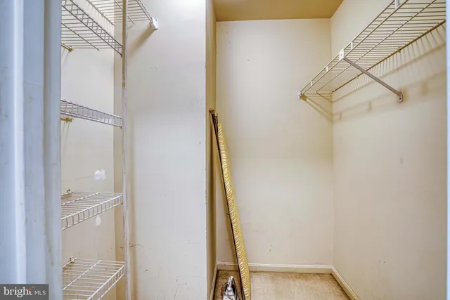 a view of balcony with wooden floor and fence