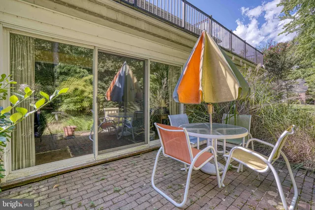 a view of a yard with furniture