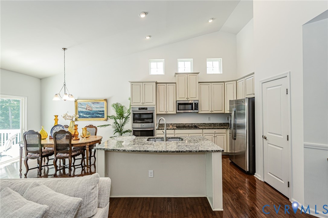 7435 Wicks Road Williamsburg, VA 23188 - Photo 36 of 82 Open-concept kitchen and dining area featuring hig