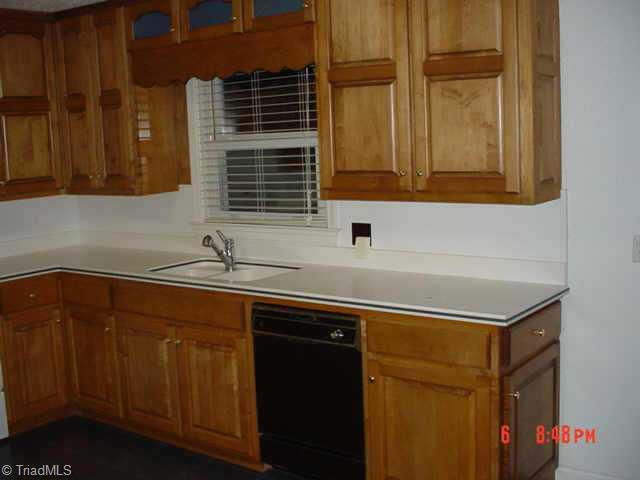 1329 Middle Brook Road Walnut Cove, NC 27052 - Photo 5 of 5 Other. New all wood cabinets, new solid counter tops, new floor, and all appliances convey to new owner!