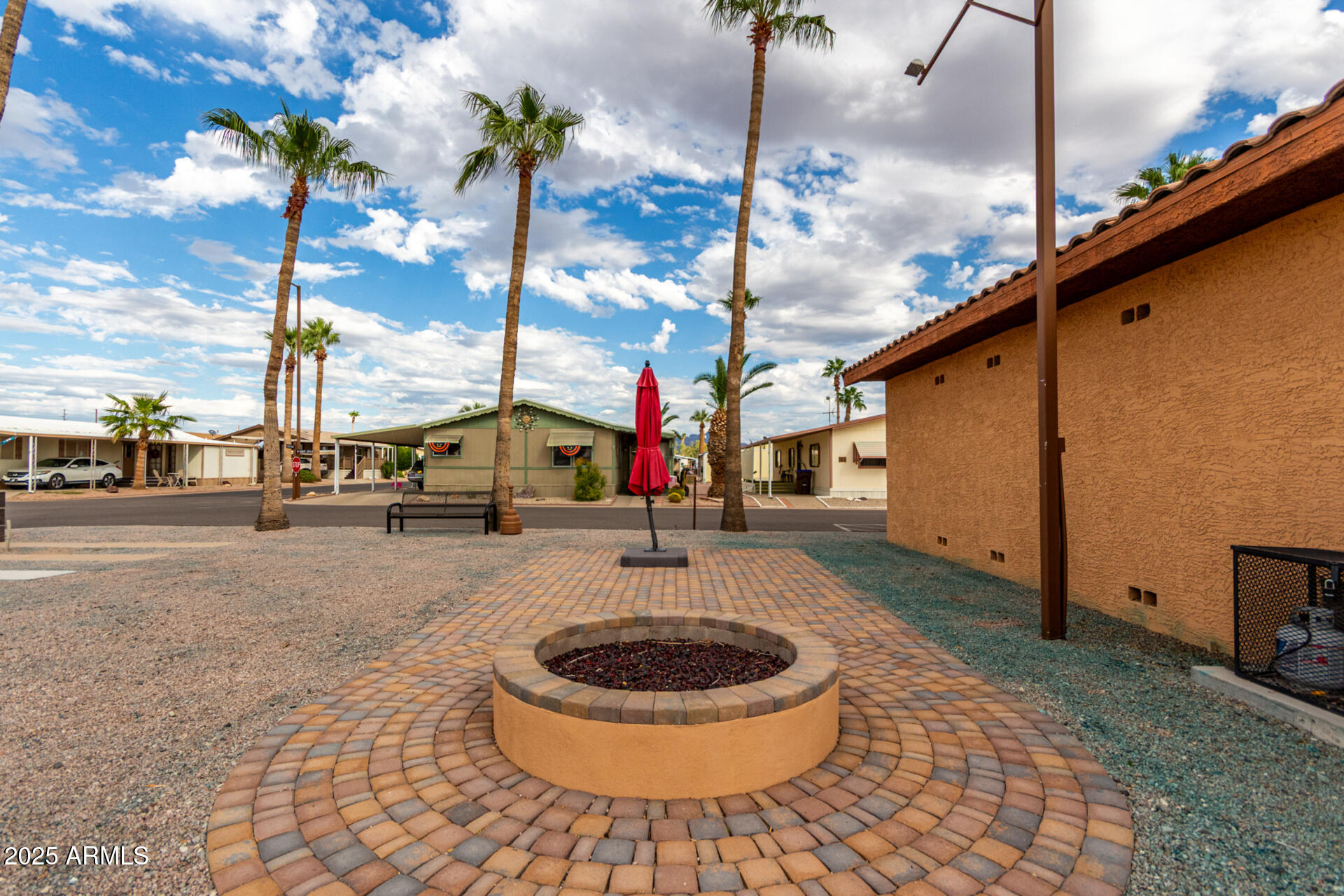 11101 East University Drive, Unit 214 Apache Junction, AZ 85120 - Photo 21 of 30 a view of a street with cars