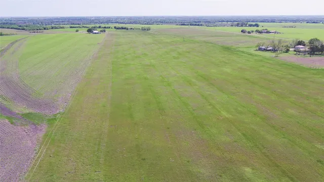 a view of a lake with a city