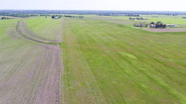 a view of a lake with a big yard