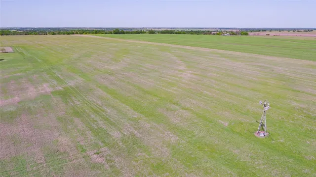 a view of a lake with a big yard