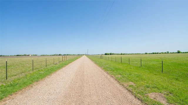 a view of a lake with a big yard