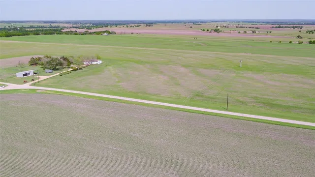 a view of an outdoor and a yard
