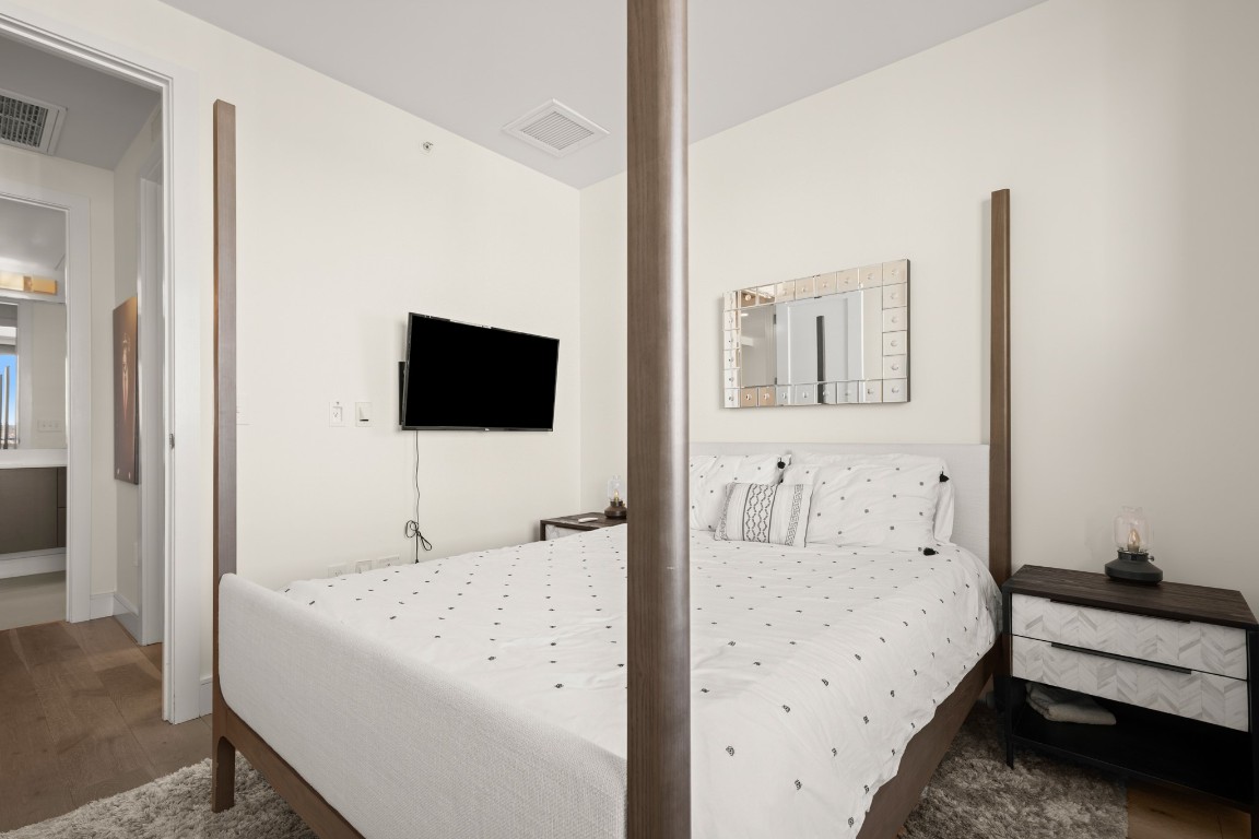 222 West Avenue, Unit 2012 Austin, TX 78701 - Photo 13 of 37 a living room with furniture and a flat screen tv