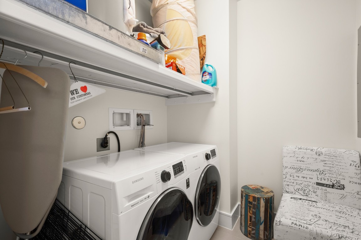 222 West Avenue, Unit 2012 Austin, TX 78701 - Photo 17 of 37 a utility room with dryer and washer