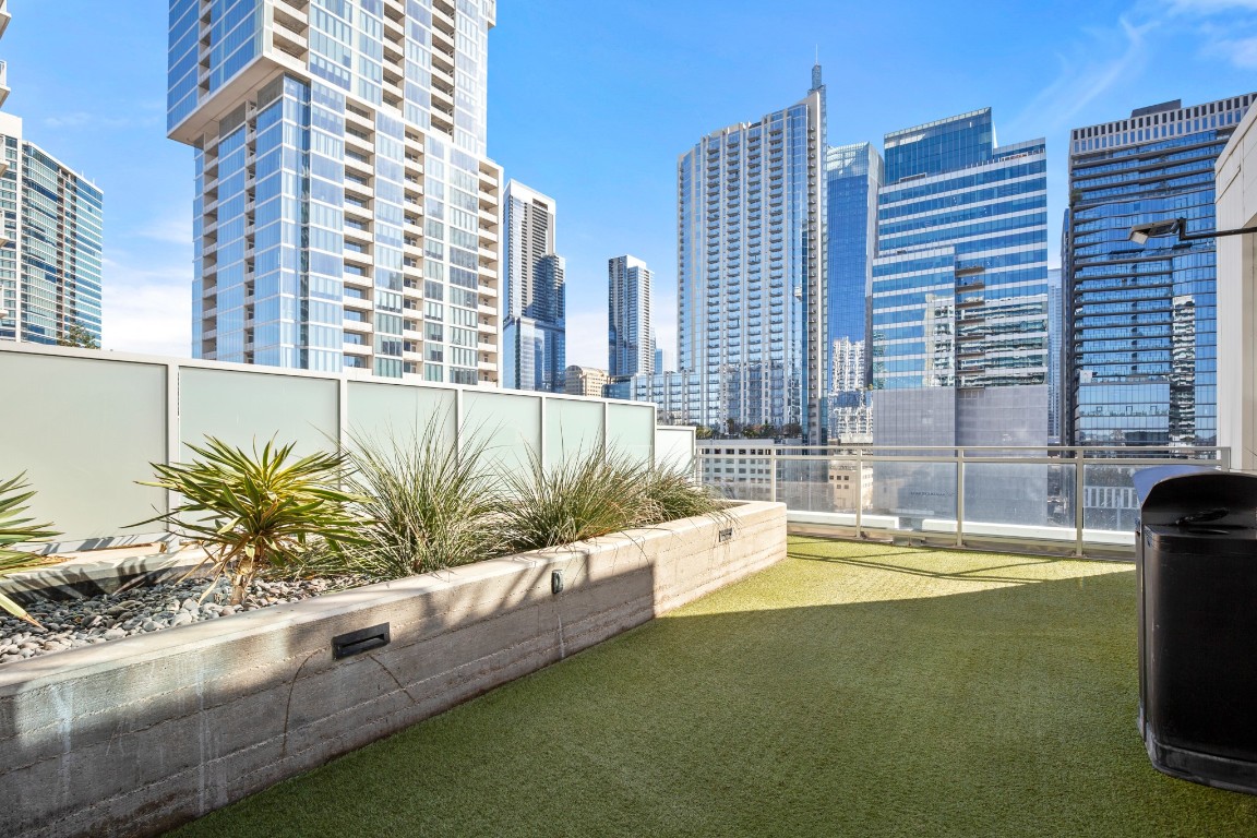 222 West Avenue, Unit 2012 Austin, TX 78701 - Photo 31 of 37 a view of an outdoor space with a swimming pool
