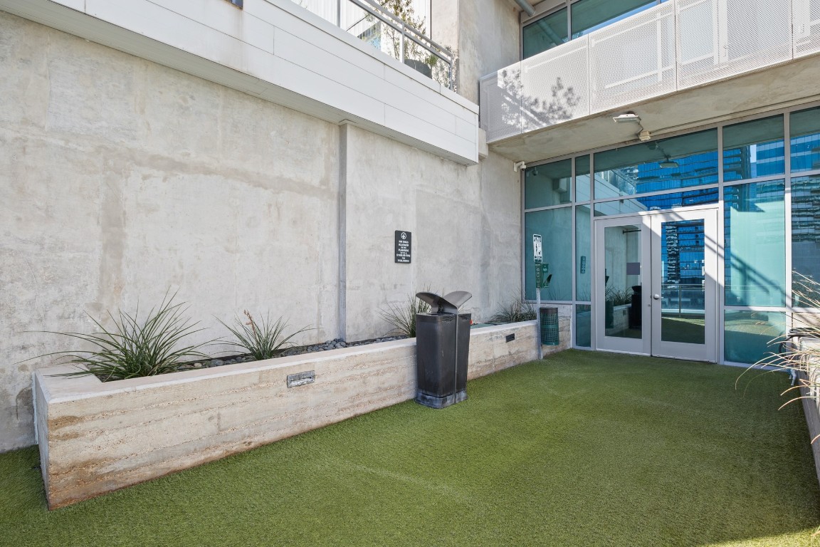 222 West Avenue, Unit 2012 Austin, TX 78701 - Photo 32 of 37 a view of a chairs and table in the room