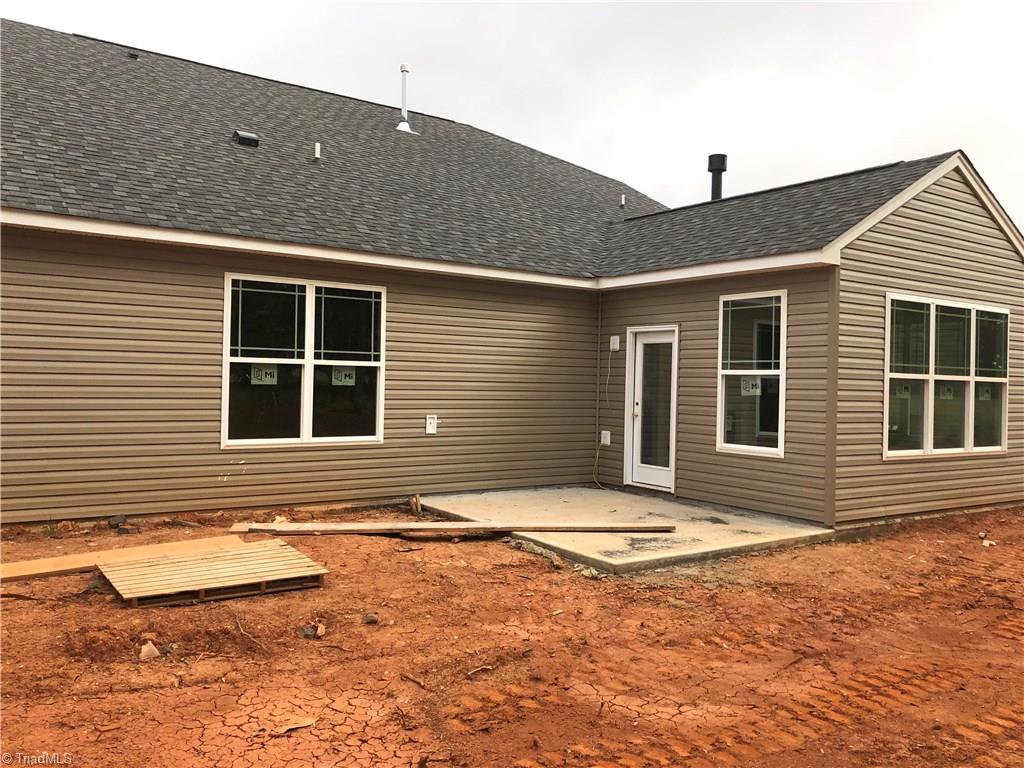 3404 Amber Mdws Road, Unit 35 High Point, NC 27265 - Photo 18 of 30 Rear exterior of home showing 12x10 patio and optional Garden Room - privacy fence to be installed