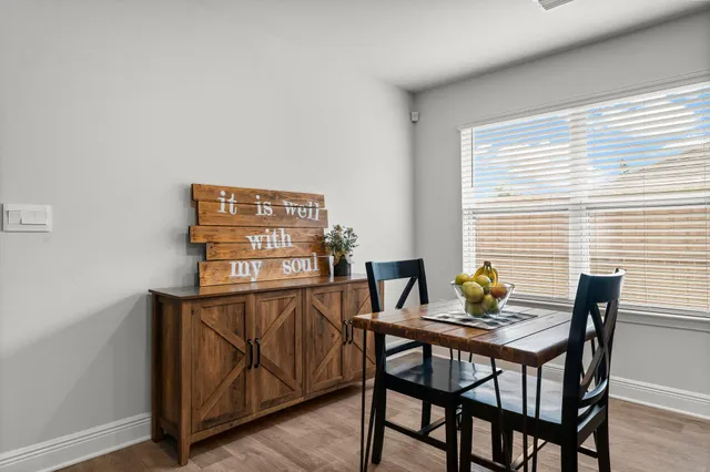 a view of a workspace with furniture