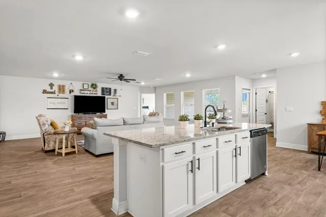 a kitchen with lots of counter space and appliances