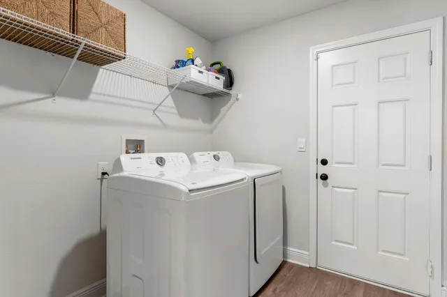 a utility room with dryer and washer