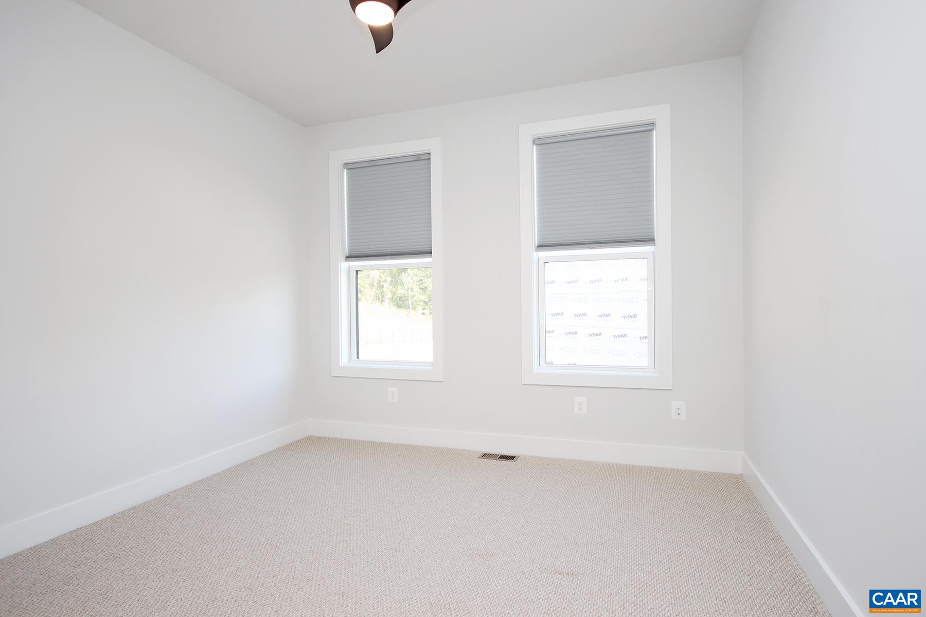 806 Wesley Lane, Unit B Charlottesville, VA 22911 - Photo 16 of 20 an empty room with a window