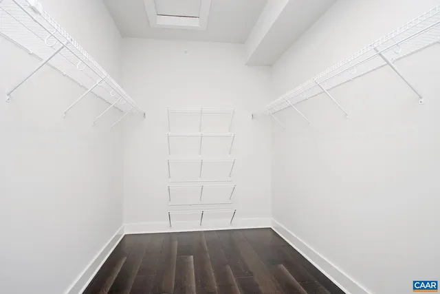 a view of room with racks on the wall