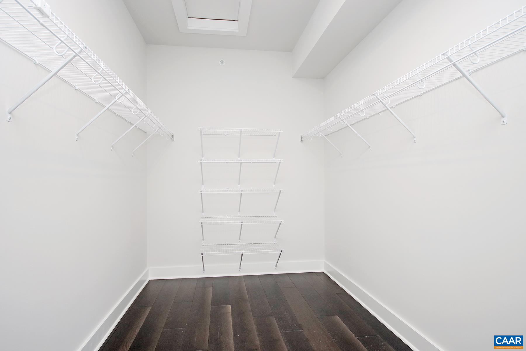806 Wesley Lane, Unit B Charlottesville, VA 22911 - Photo 10 of 20 a view of room with racks on the wall