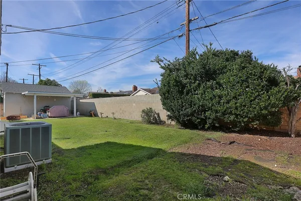 a house view with a garden space