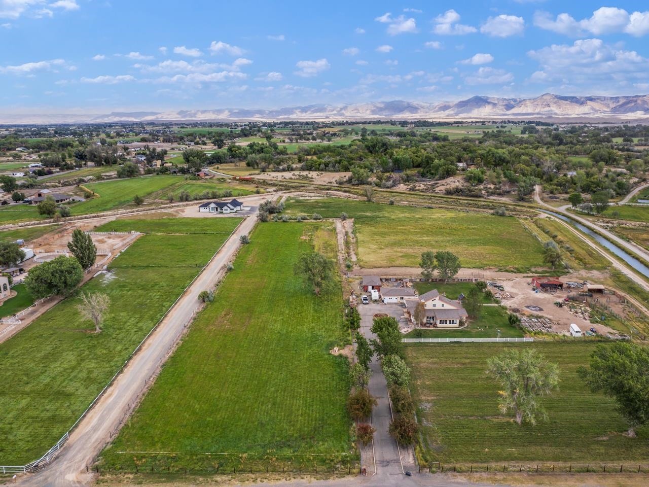 2324 I Road Grand Junction, CO 81505 - Photo 4 of 11 a view of a lake with a mountain