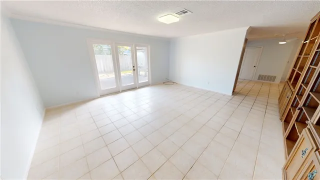 an empty room with windows