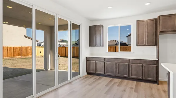 a spacious bathroom with a vanity and a shower