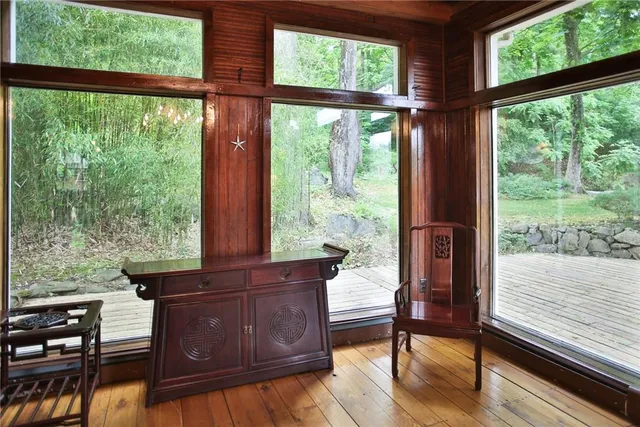 a view of livingroom with furniture and floor to ceiling window