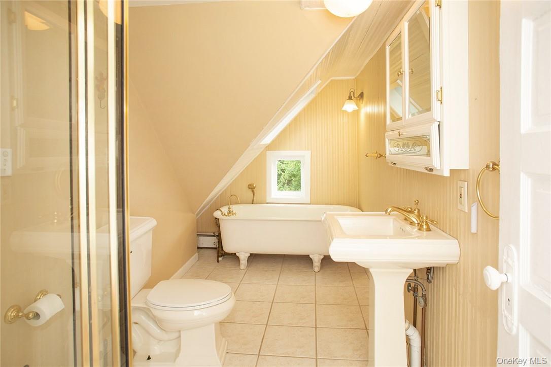 6 Stable Road Tuxedo Park, NY 10987 - Photo 19 of 28 a bathroom with a sink and a mirror