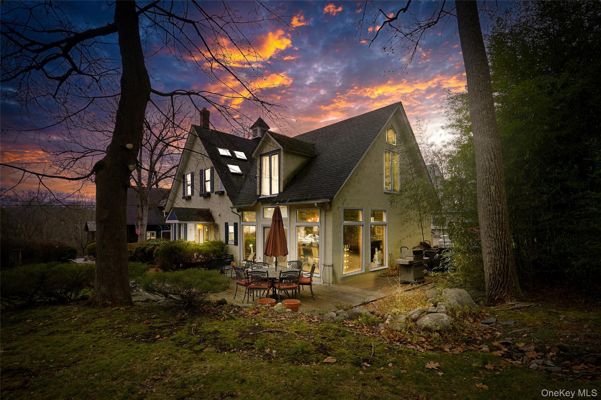 6 Stable Road Tuxedo Park, NY 10987 - Photo 2 of 28 a front view of a house with a yard