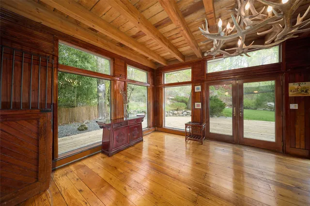 a living room with furniture and windows