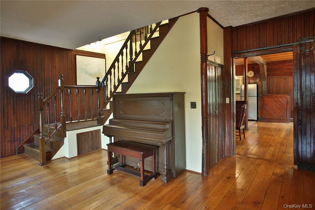 6 Stable Road Tuxedo Park, NY 10987 - Photo 6 of 28 a view of entryway and hall with wooden floor