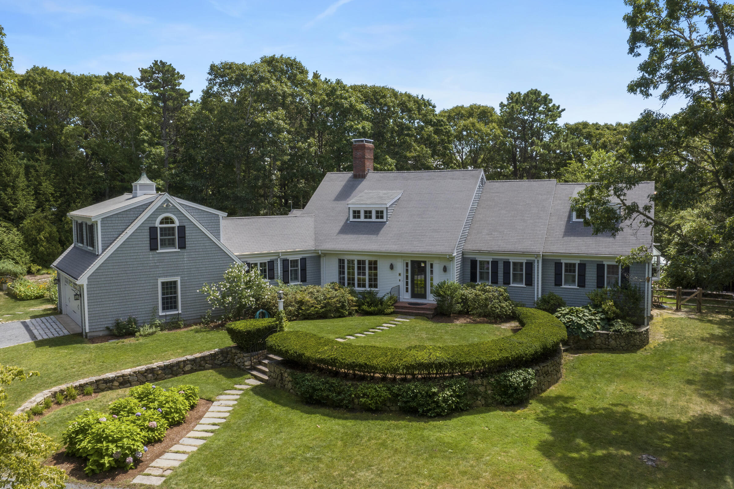 175 Starboard Lane Osterville, MA 02655 - Photo 11 of 39 a view of a house with a garden