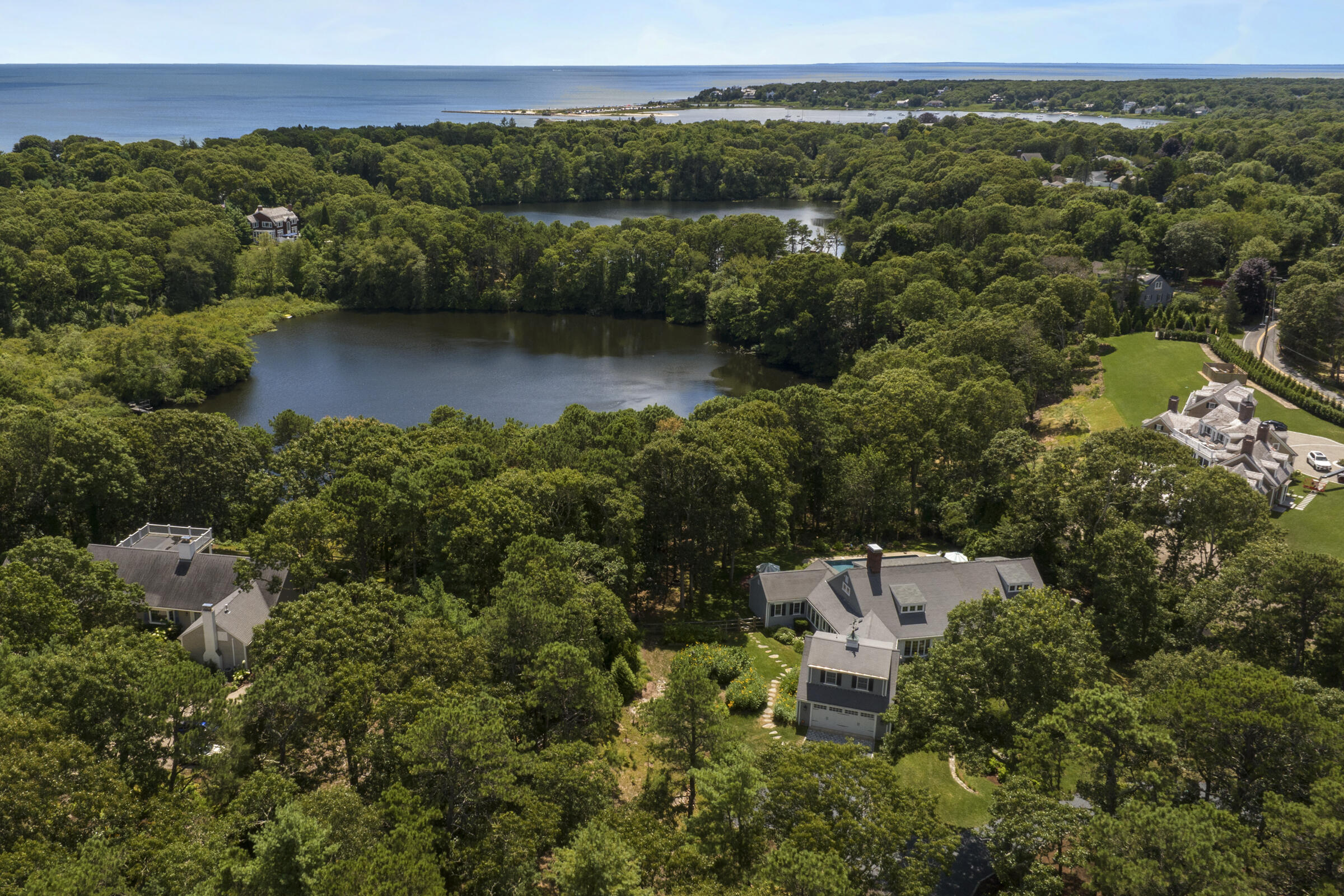 175 Starboard Lane Osterville, MA 02655 - Photo 2 of 39 an aerial view of a house with a yard