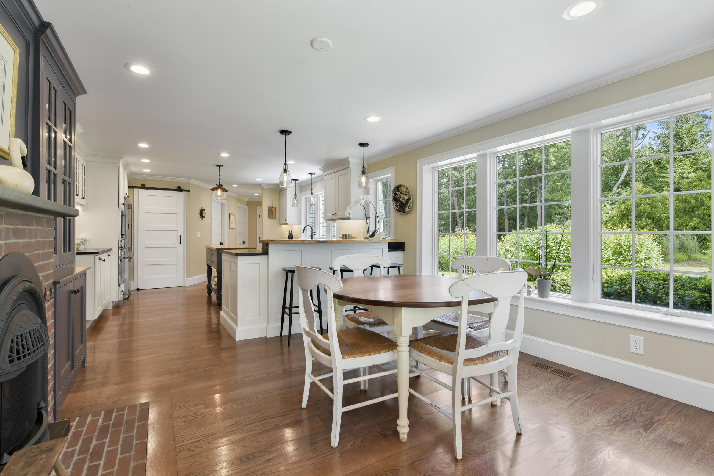 175 Starboard Lane Osterville, MA 02655 - Photo 21 of 39 a dining room with furniture and a floor to ceiling window