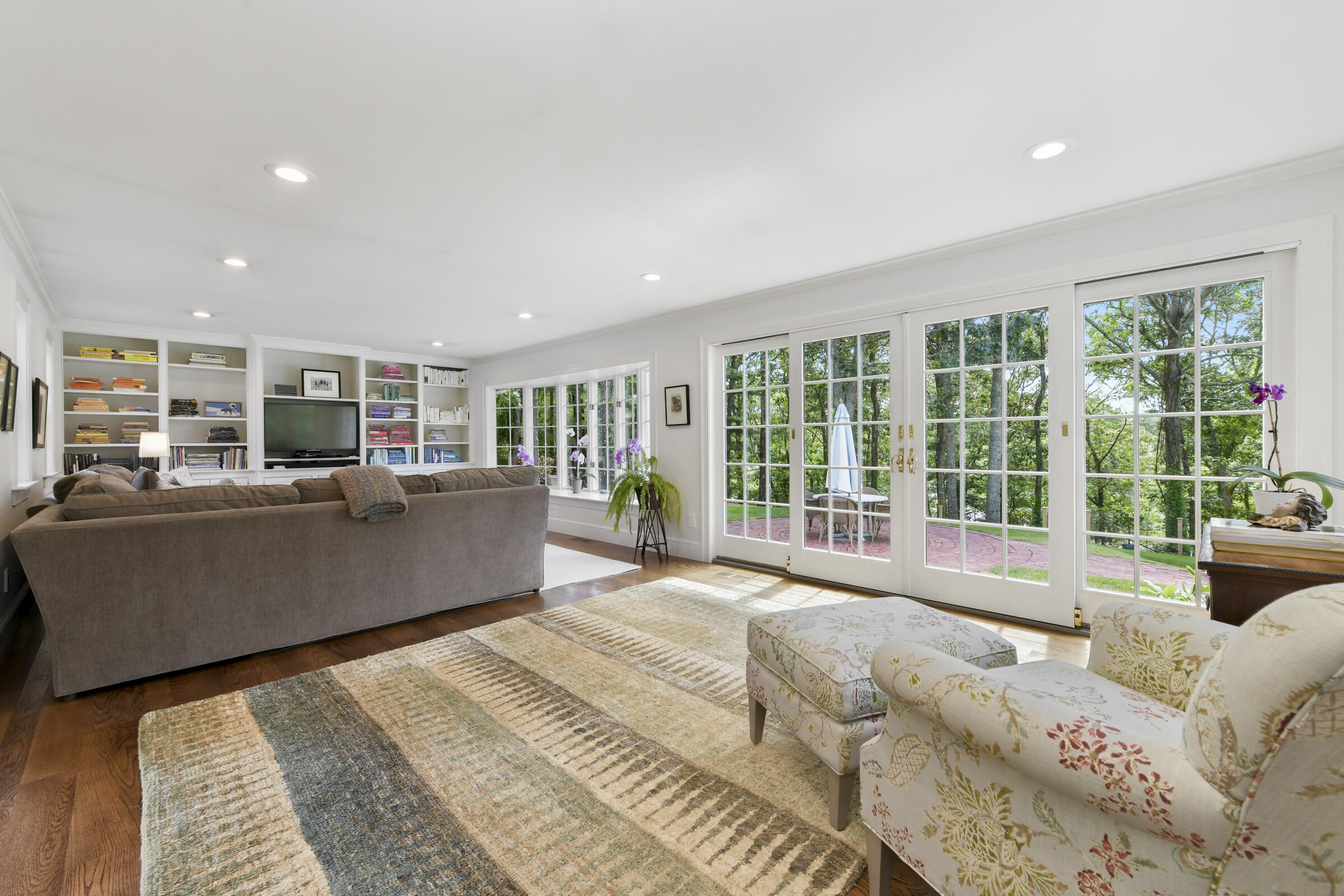 175 Starboard Lane Osterville, MA 02655 - Photo 24 of 39 a living room with furniture and a large window with outer view